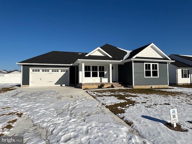 single story home with a garage