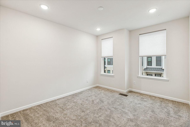 view of carpeted spare room