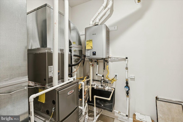 utility room with tankless water heater