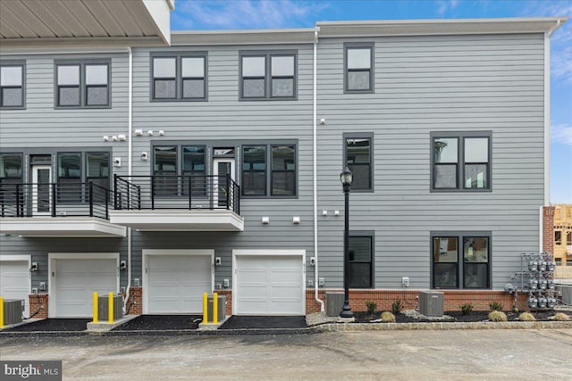 view of front of property with central air condition unit