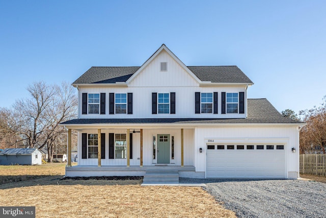 modern inspired farmhouse featuring driveway, a shingled roof, fence, and a porch