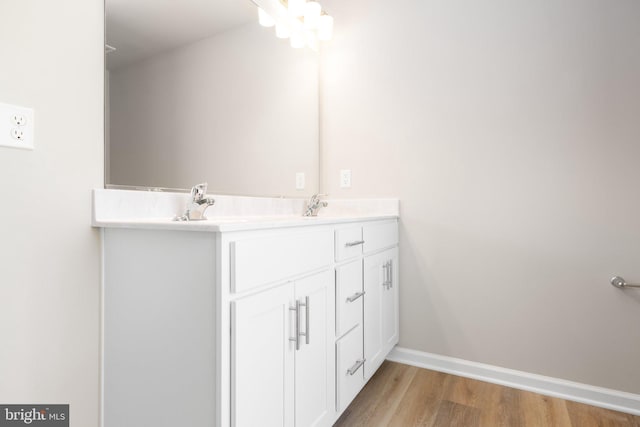 LOT4 Lakeview Dr, Colonial Beach, VA 22443 - bathroom with double vanity, a sink, baseboards, and wood finished floors