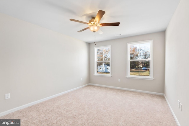 LOT4 Lakeview Dr, Colonial Beach, VA 22443 - spare room featuring light carpet, ceiling fan, visible vents, and baseboards