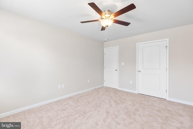 LOT4 Lakeview Dr, Colonial Beach, VA 22443 - unfurnished bedroom with carpet floors, ceiling fan, and baseboards