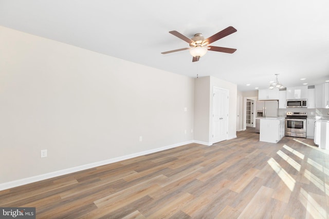 LOT4 Lakeview Dr, Colonial Beach, VA 22443 - unfurnished living room with recessed lighting, ceiling fan, light wood-style flooring, and baseboards