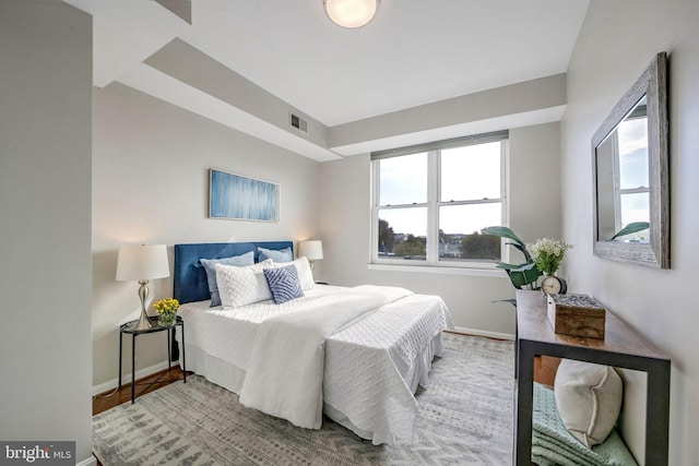 bedroom featuring wood-type flooring