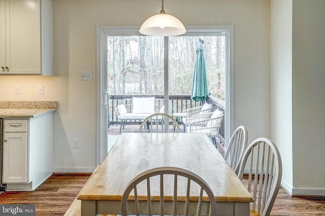 dining area with light hardwood / wood-style flooring