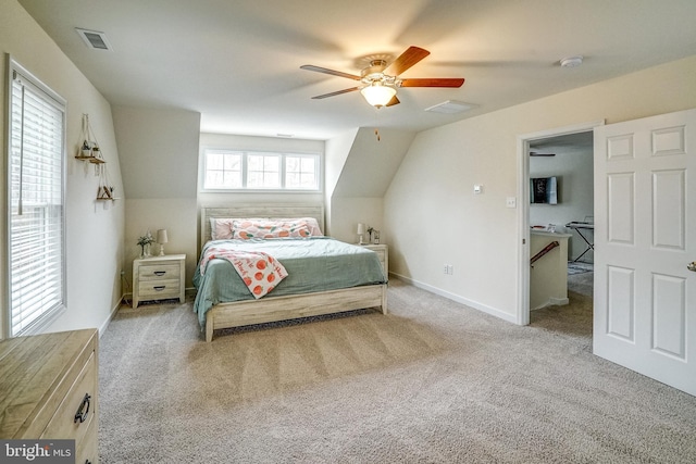 bedroom with ceiling fan and light colored carpet