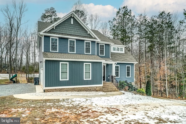 view of front of home featuring a playground