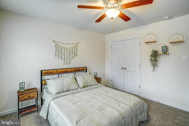 carpeted bedroom featuring a closet and ceiling fan