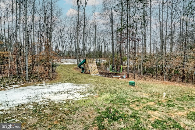 view of yard with a playground