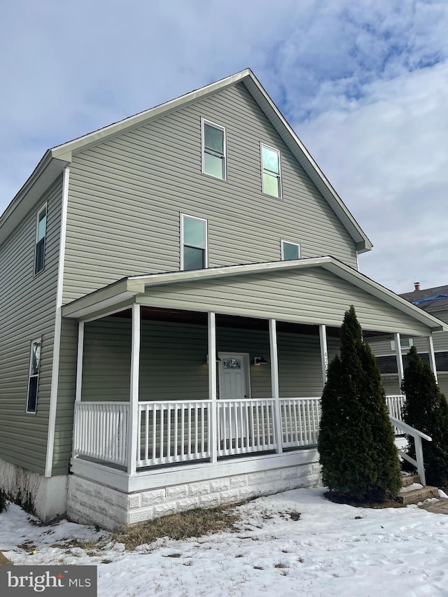 view of front of home featuring covered porch