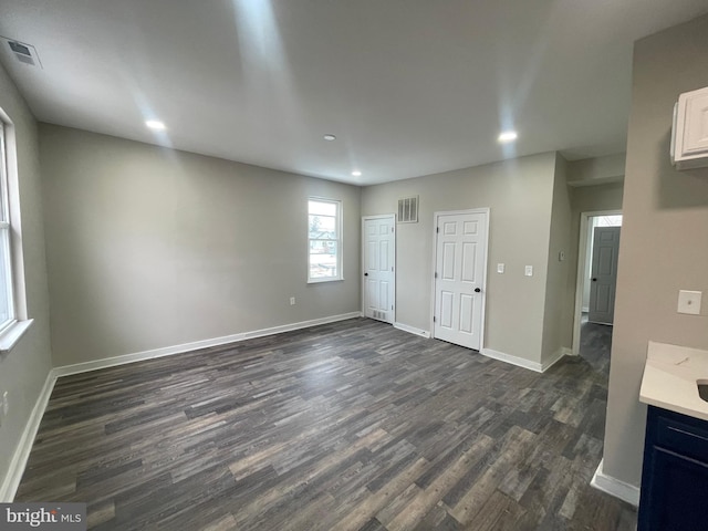 interior space featuring dark wood-type flooring