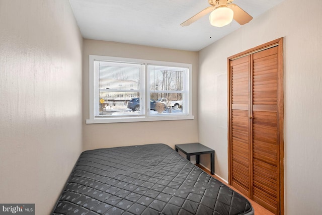 bedroom featuring ceiling fan