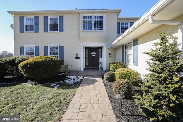 view of front of home with a front yard