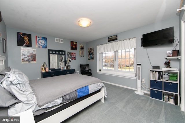 bedroom featuring carpet