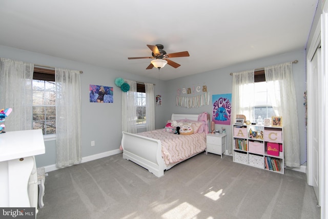 carpeted bedroom with ceiling fan