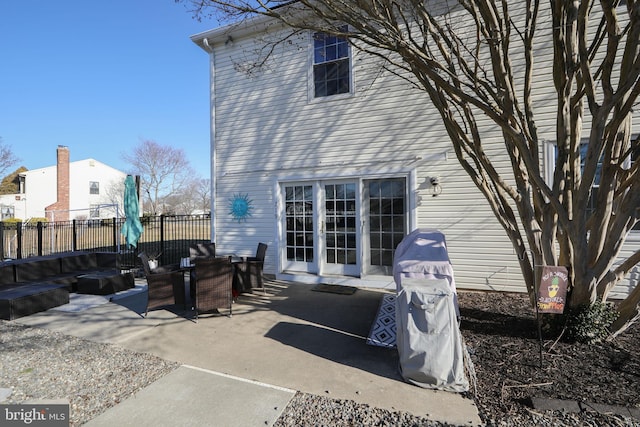 back of property featuring a patio area