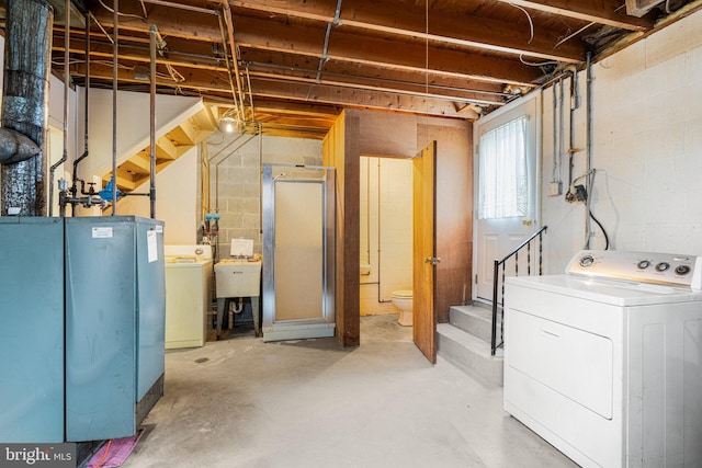 basement with washer / dryer and sink