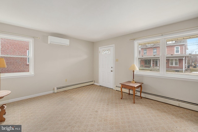 interior space with baseboard heating and a wall mounted AC