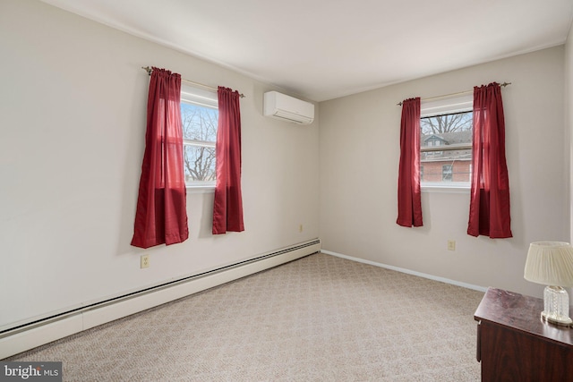 carpeted spare room featuring a wall unit AC, baseboard heating, and plenty of natural light