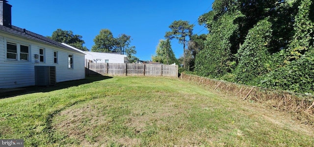 view of yard featuring central AC unit