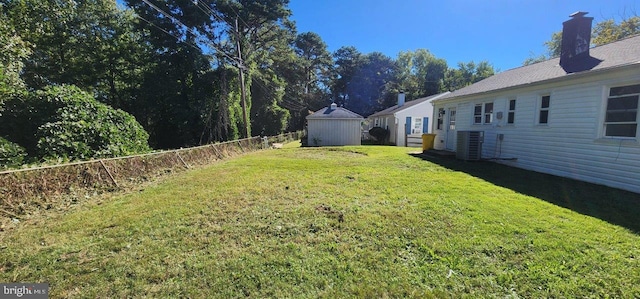 view of yard with central AC unit