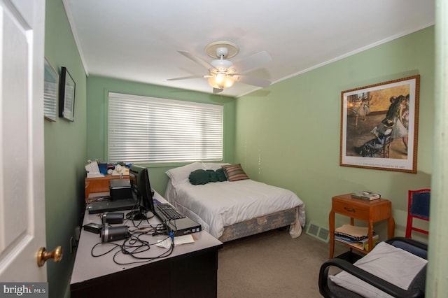 bedroom featuring carpet flooring, ceiling fan, and ornamental molding