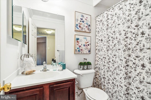 bathroom featuring vanity, crown molding, curtained shower, and toilet