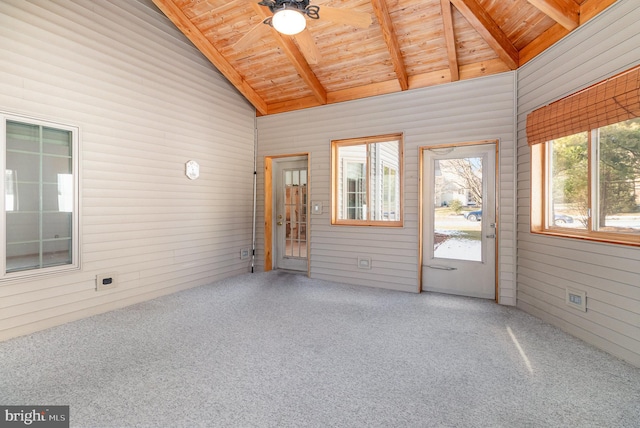 unfurnished sunroom featuring wood ceiling and vaulted ceiling with beams