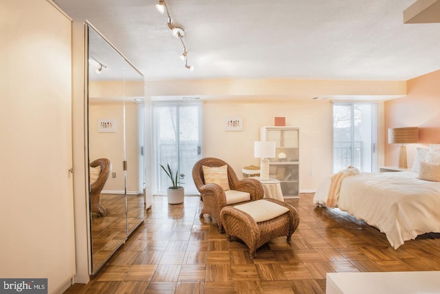 bedroom with parquet flooring