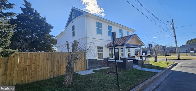 view of front of property with a front lawn