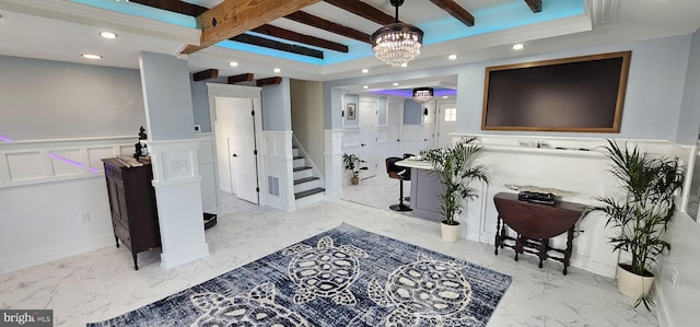 interior space featuring beamed ceiling and a chandelier