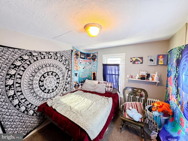 carpeted bedroom with a textured ceiling