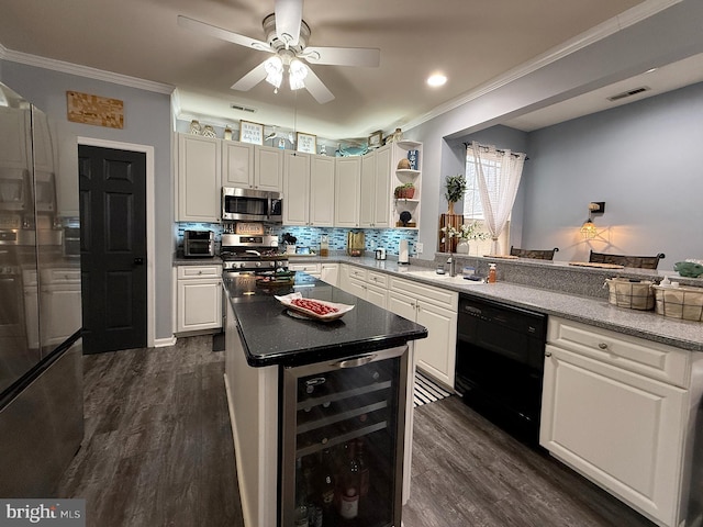 kitchen featuring white cabinets, appliances with stainless steel finishes, dark hardwood / wood-style flooring, wine cooler, and backsplash