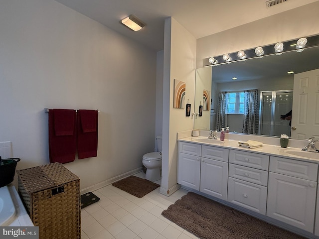 bathroom with toilet, a shower, tile patterned floors, and vanity