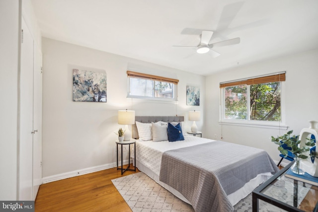 bedroom featuring ceiling fan and hardwood / wood-style floors