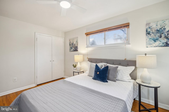 bedroom featuring a closet, ceiling fan, and wood-type flooring