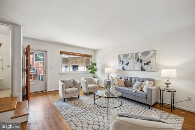 living room with light hardwood / wood-style flooring