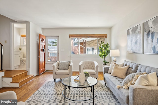 living room with light hardwood / wood-style flooring