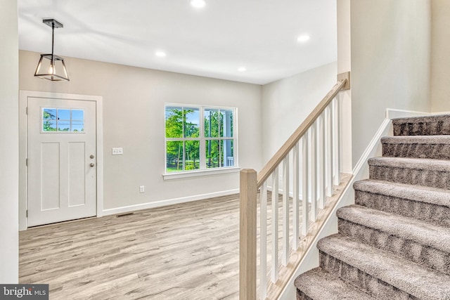 foyer with light wood-type flooring