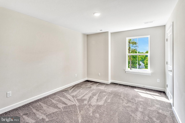 view of carpeted spare room