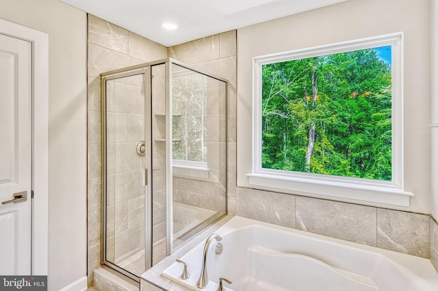 bathroom with independent shower and bath