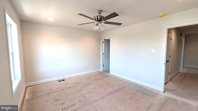 spare room featuring ceiling fan