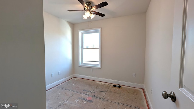 unfurnished room with ceiling fan