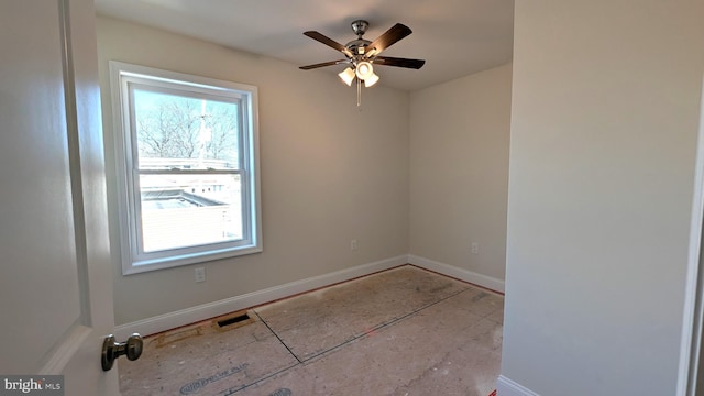 empty room featuring ceiling fan