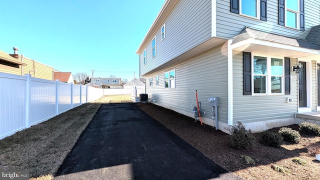 view of home's exterior with central air condition unit