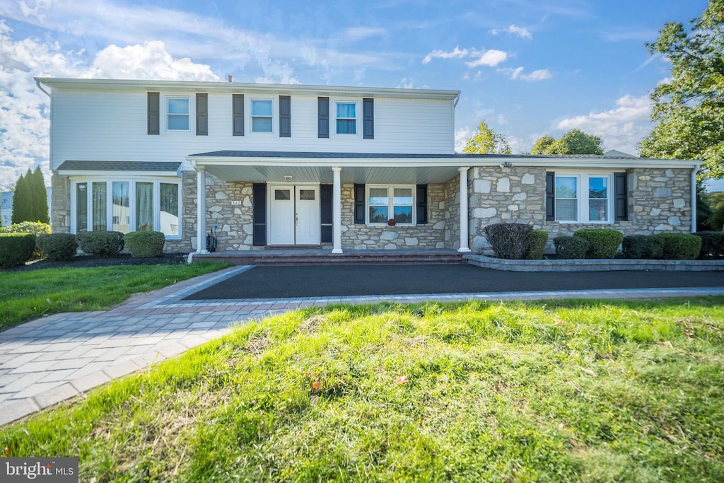 view of front of home featuring covered porch