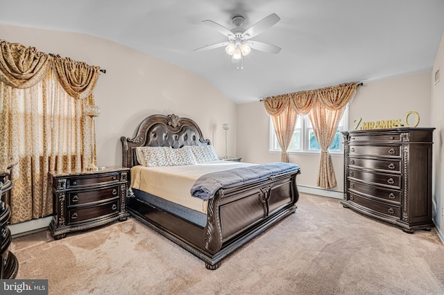 carpeted bedroom with a baseboard heating unit, ceiling fan, and lofted ceiling