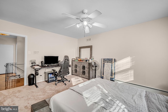 bedroom with ceiling fan and carpet